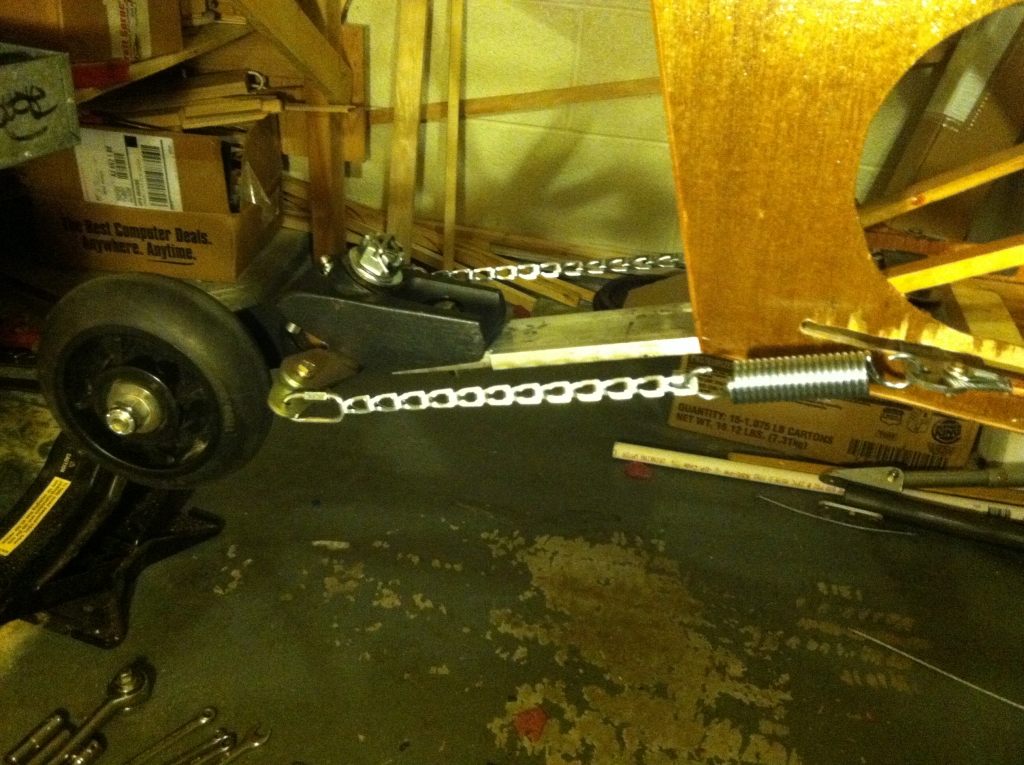 Chains hooked to tail wheel